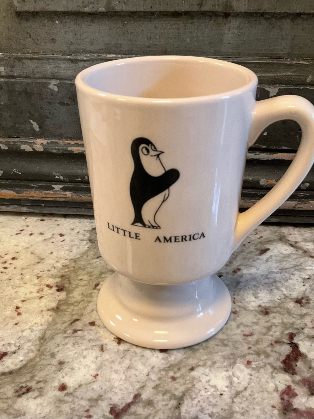 Vintage Little America Hotel footed ceramic coffee mug